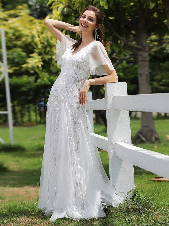 Kaylee | Long Romantic Shimmering Evening Dress with V-Neck and Straps