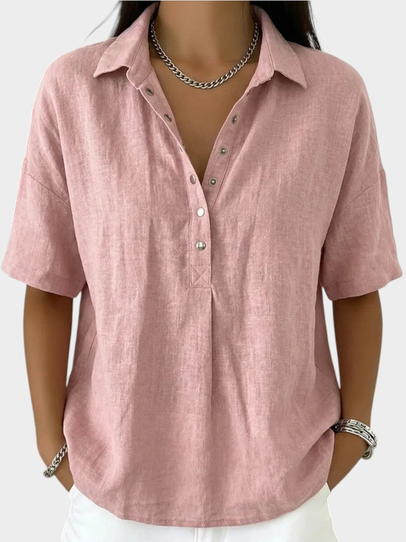 Victoria Boutique Adèle pink cotton blend blouse with collar, V-neck, and front button detail on a model